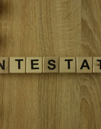 Intestate word from wooden blocks on desk